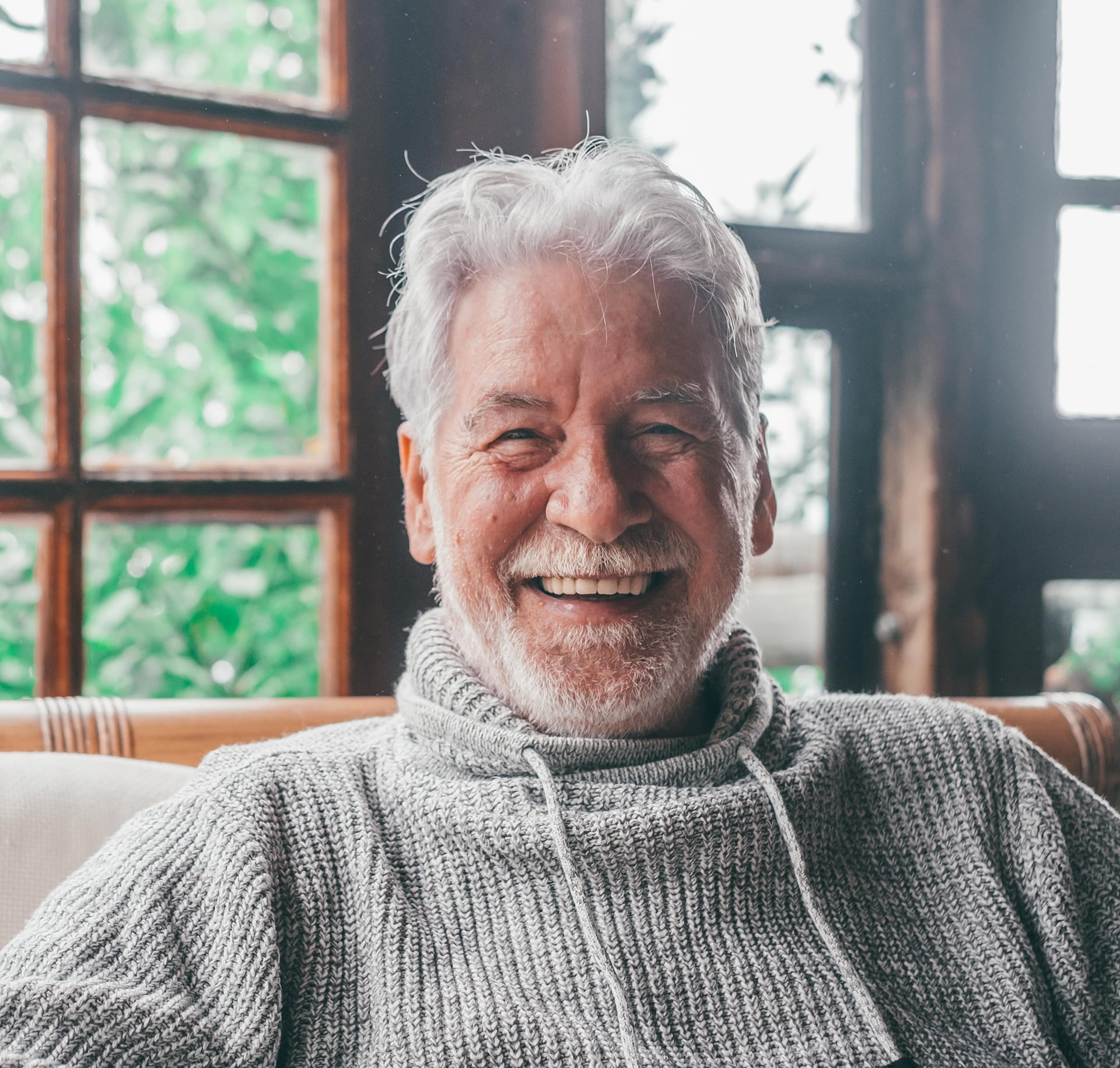 man smiling after medical dermatology treatment at Halo Skin Institute