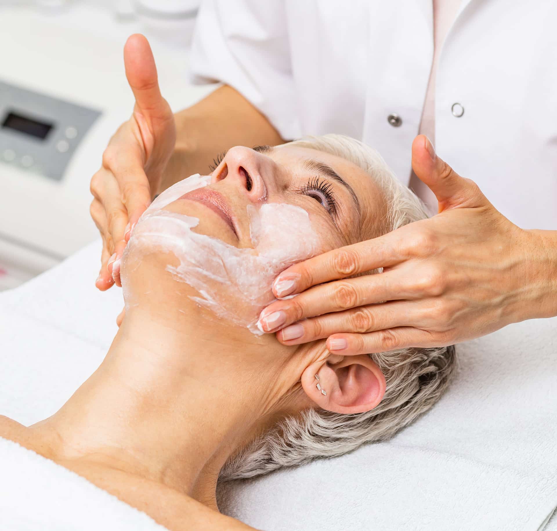 woman patient during medical skin treatment at Halo Skin Institute 